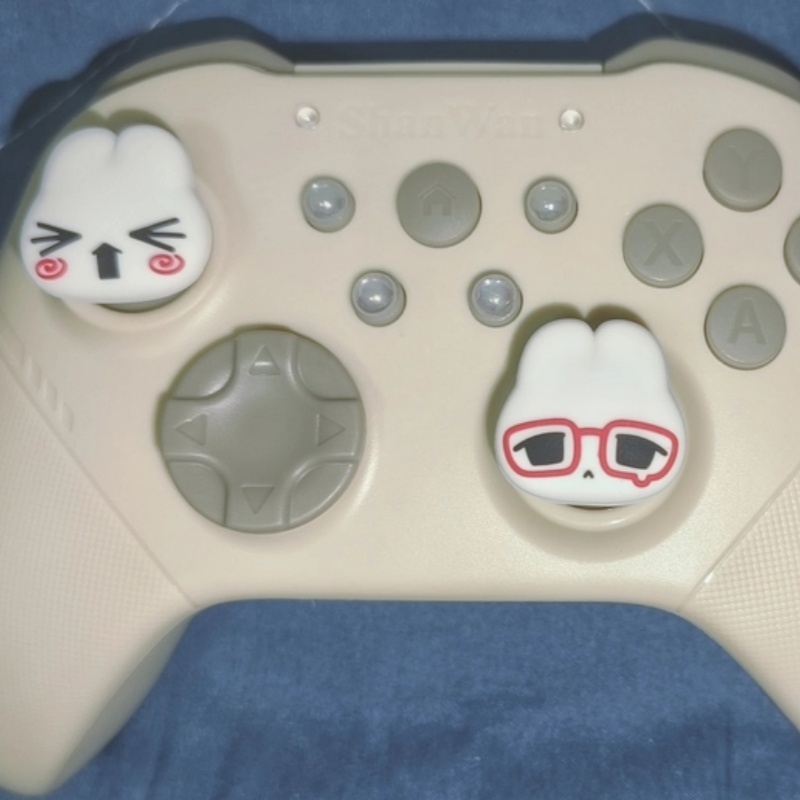 かわいい漫画レトロメガネバニーシリコン親指グリップスイッチ  - Gaming Accessories In China のレビューと価格